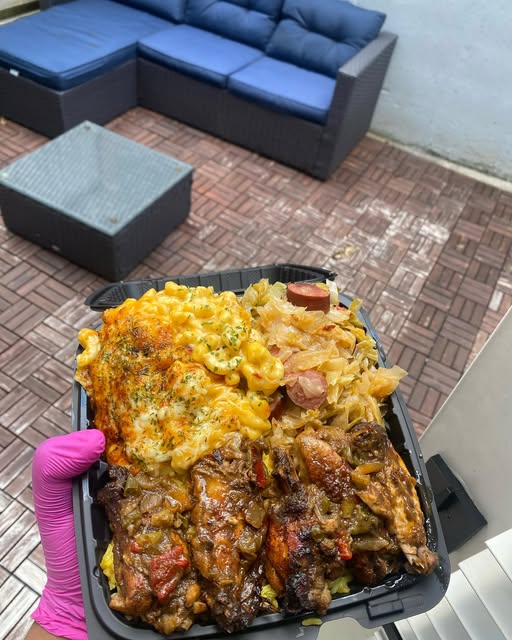 Loaded jerk plate with mac and cheese and cabbage