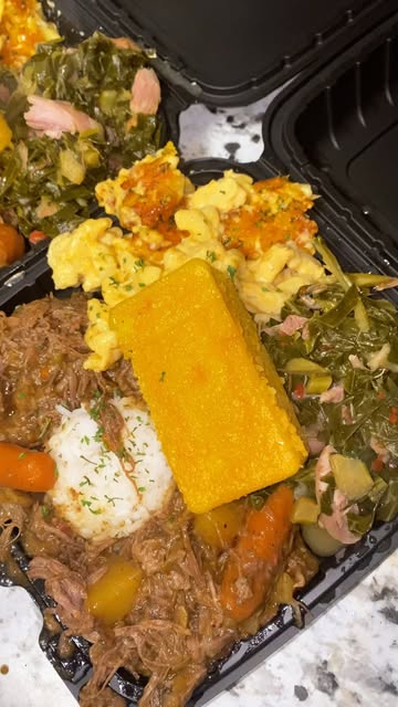 Soul food platter with cornbread and collards